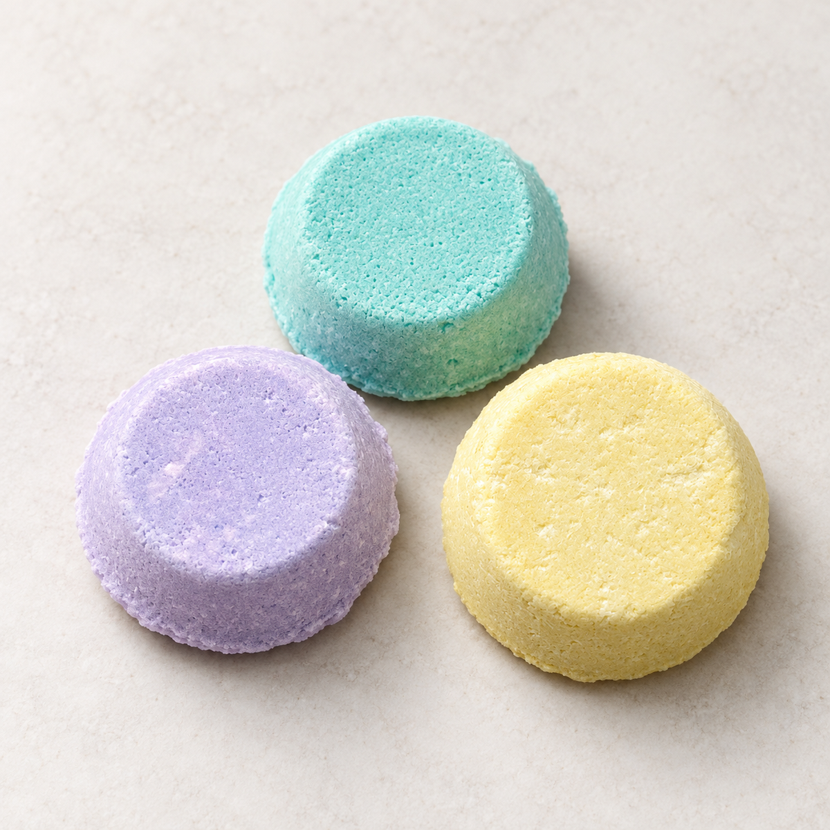 Eucalyptus, lavender, and lemongrass shower steamers shown one of each; the variety pack contains two of each scent.